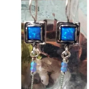 Bluenoemi Israel Jewelry Sterling Silver Earrings for Woman set with blue lab opals.