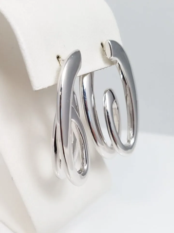 Contemporary 18k White Gold Hollow Swirl Hoop Earrings