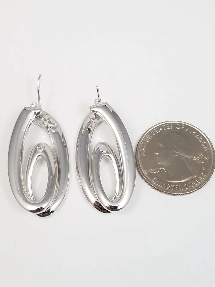 Contemporary 18k White Gold Hollow Swirl Hoop Earrings