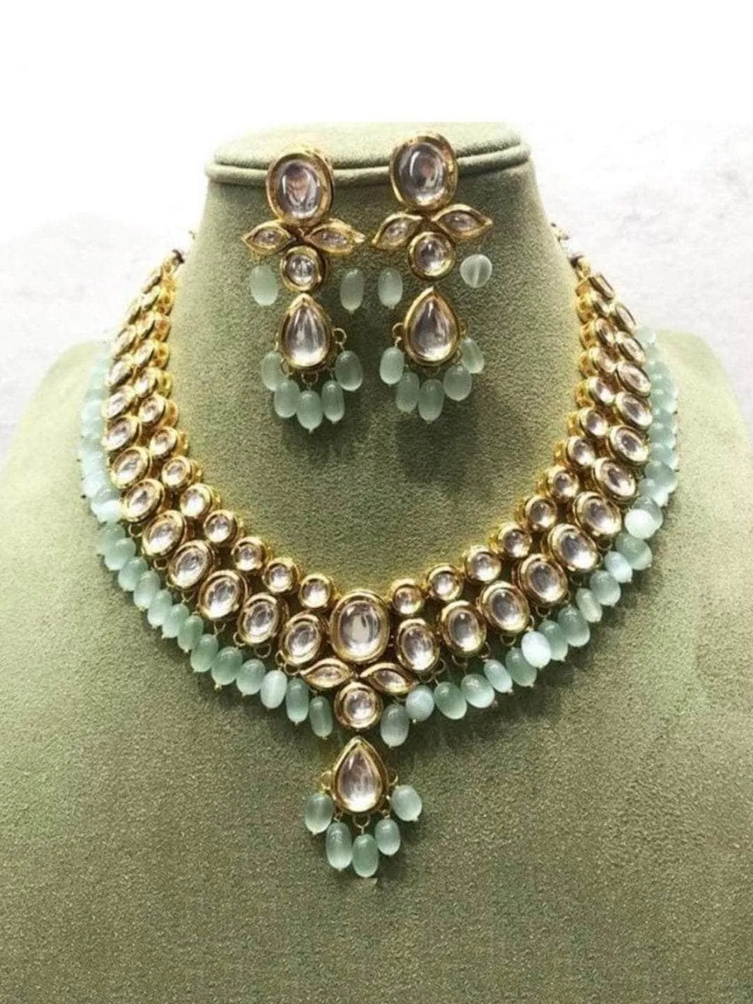 Oval And Leaf Kundan Necklace