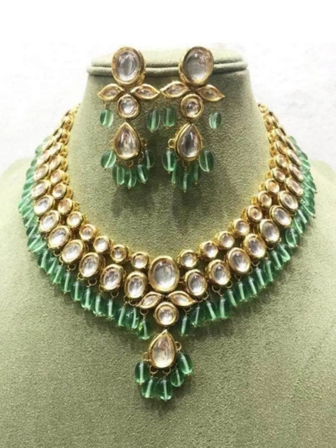 Oval And Leaf Kundan Necklace